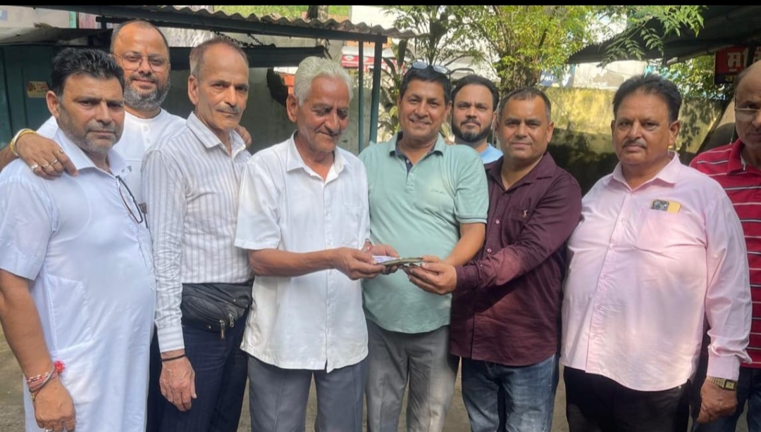 People working in Tehsil Complex Garhshankar donated to the Chief Minister's Flood Relief Fund.